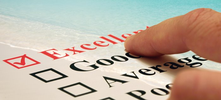 Outdoor image of a house with lighted landscape. Quote - Indoor and out, EF Electric will light up your world.